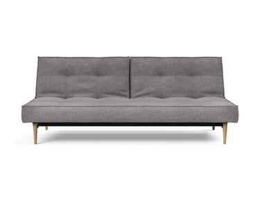 Splitback Styletto Light Wood sovesofa i 282 Avella Warm Grey, set forfra