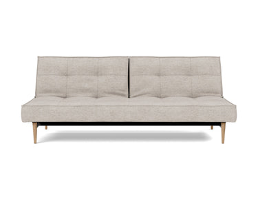 Splitback Styletto Light Wood sovesofa i 471 Yuveno Sand, set forfra