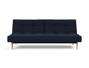 Splitback Styletto Light Wood sovesofa i 528 Mixed Dance Blue, set forfra