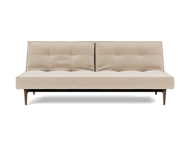 Splitback Styletto Dark Wood sovesofa i 410 Esina Almond, set forfra