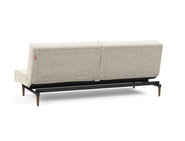 Splitback Styletto Dark Wood sovesofa i 357 Taura Off White, set skråt bagfra