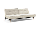 Splitback Styletto Dark Wood sovesofa i 357 Taura Off White, med den ene ryghalvdel lænet tilbage