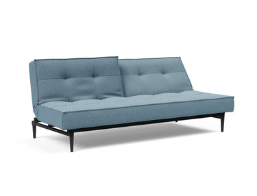 Splitback Styletto Black Wood sovesofa i 525 Mixed Dance Light Blue, med den ene ryghalvdel lænet tilbage