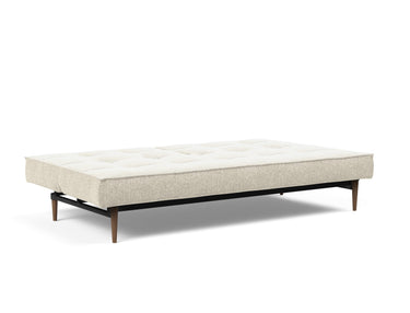 Splitback Styletto Dark Wood sovesofa i 357 Taura Off White, slået ud til seng