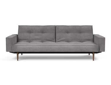 Splitback Styletto Dark Wood sovesofa med armlæn i 282 Avella Warm Grey, set forfra