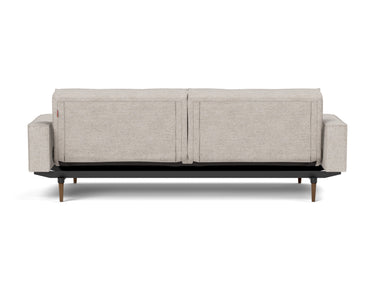 Splitback Styletto Dark Wood sovesofa med armlæn i 471 Yuveno Sand, set bagfra