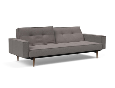 Splitback Styletto Dark Wood sovesofa med armlæn i 521 Mixed Dance Grey, med den ene ryghalvdel lænet tilbage