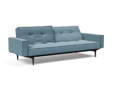 Splitback Styletto Black Wood sovesofa med armlæn i 525 Mixed Dance Light Blue, med den ene ryghalvdel lænet tilbage