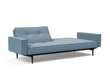 Splitback Styletto Black Wood sovesofa med armlæn i 525 Mixed Dance Light Blue, med den ene ryghalvdel lagt ned