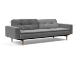 Dublexo Styletto Dark Wood sovesofa med armlæn i 563 Twist Charcoal, med den ene ryghalvdel lænet tilbage