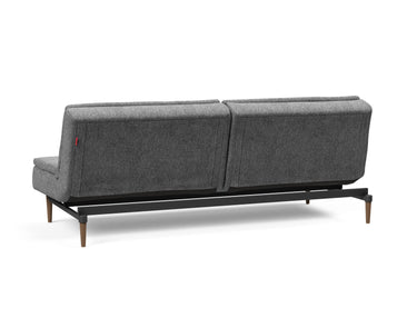 Dublexo Styletto Dark Wood sovesofa i 563 Twist Charcoal, set skråt bagfra