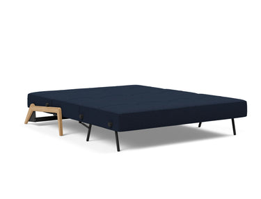 Cubed 160 Wood sovesofa i 528 Mixed Dance Blue, slået ud til seng