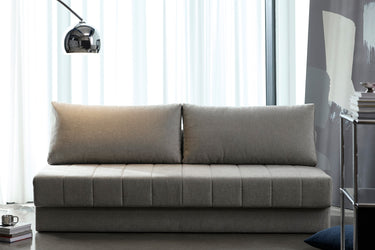 Akello sovesofa i 280 Avella Sand i en stue